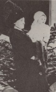 Mary Katharine holding her son, Smith Reynolds.